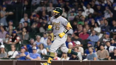 CHICAGO, ILLINOIS – SEPTEMBER 17: Shea Langeliers #23 of the Oakland Athletics runs around the bases after hitting a solo home run in the fifth inning against the Chicago Cubs at Wrigley Field on September 17, 2024 in Chicago, Illinois. (Photo by Griffin Quinn/Getty Images)