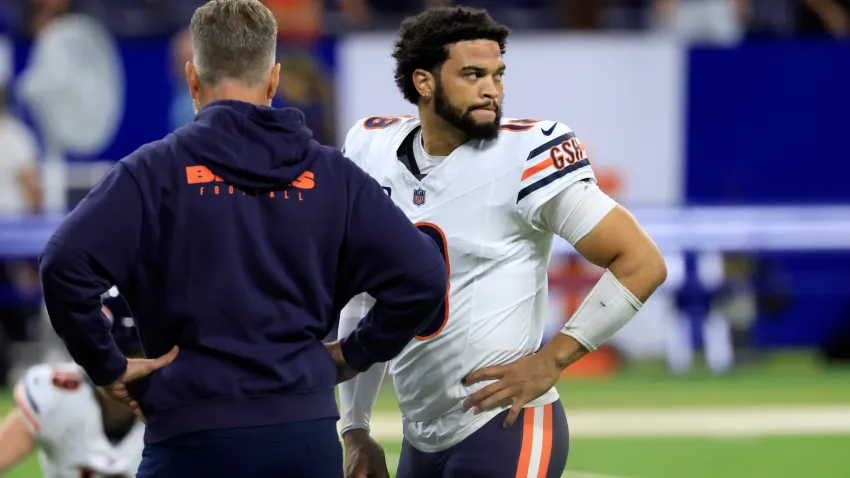 INDIANAPOLIS, INDIANA – SEPTEMBER 22: Head coach Matt Eberflus and quarterback Caleb Williams #18 of the Chicago Bears speak on the field prior to a game against the Indianapolis Colts at Lucas Oil Stadium on September 22, 2024 in Indianapolis, Indiana. (Photo by Justin Casterline/Getty Images)