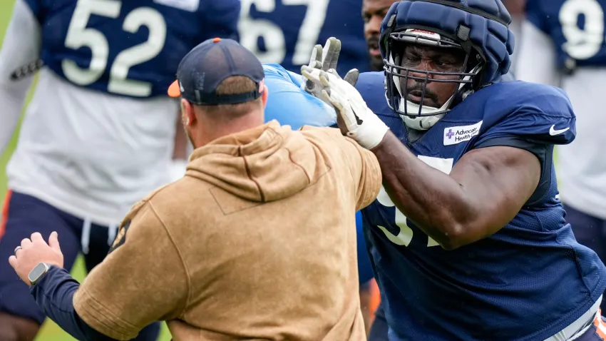 Chicago Bears defensive tackle Andrew Billings (97) runs a drill at the Chicago Bears Halas Hall practice facility in Lake Forest, Ill., on Thursday, Aug. 15, 2024.