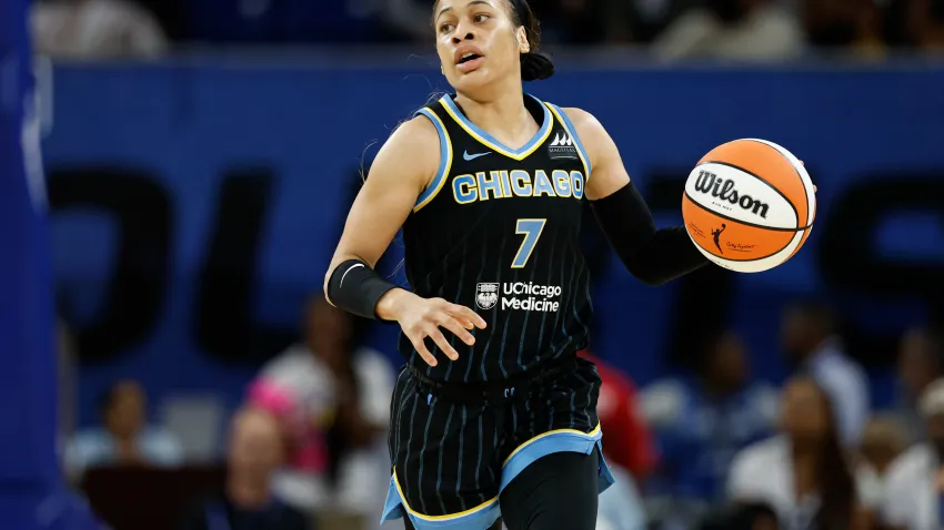 Aug 25, 2024; Chicago, Illinois, USA; Chicago Sky guard Chennedy Carter (7) brings the ball up court against the Las Vegas Aces during the first half at Wintrust Arena. Mandatory Credit: Kamil Krzaczynski-USA TODAY Sports