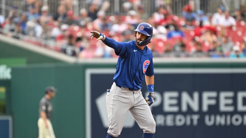 Aug 31, 2024; Washington, District of Columbia, USA; Chicago Cubs shortstop Dansby Swanson (7) reacts after reaching second base against the Washington Nationals during the fifth inning at Nationals Park. Mandatory Credit: Rafael Suanes-USA TODAY Sports