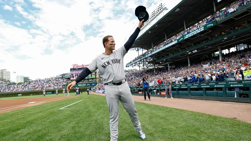 Sep 6, 2024; Chicago, Illinois, USA; New York Yankees first baseman Anthony Rizzo (48) waves to fans as he is introduced before a baseball game against the Chicago Cubs at Wrigley Field. Mandatory Credit: Kamil Krzaczynski-Imagn Images