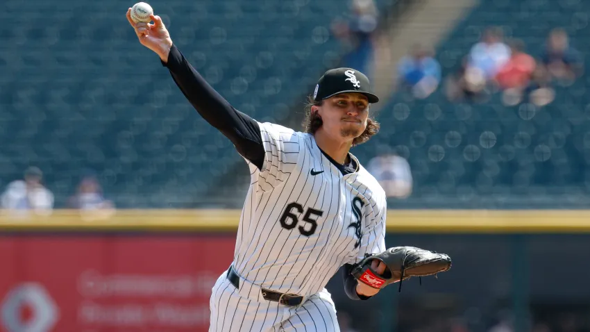 Sep 11, 2024; Chicago, Illinois, USA; Chicago White Sox starting pitcher Davis Martin (65) delivers a pitch against the Cleveland Guardians during the first inning at Guaranteed Rate Field. Mandatory Credit: Kamil Krzaczynski-Imagn Images