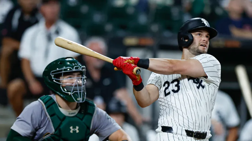 Sep 14, 2024; Chicago, Illinois, USA; Chicago White Sox outfielder Andrew Benintendi (23) hits a walk-off home run against the Oakland Athletics during the ninth inning at Guaranteed Rate Field. Mandatory Credit: Kamil Krzaczynski-Imagn Images