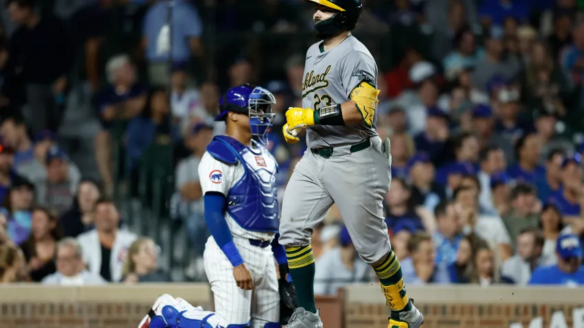 Sep 17, 2024; Chicago, Illinois, USA; Oakland Athletics catcher Shea Langeliers (23) crosses home plate after hitting a solo home run against the Chicago Cubs during the fifth inning at Wrigley Field. Mandatory Credit: Kamil Krzaczynski-Imagn Images